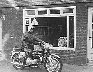 Ed Pols on a Münch Mammut in front of his first store in the Torresstraat